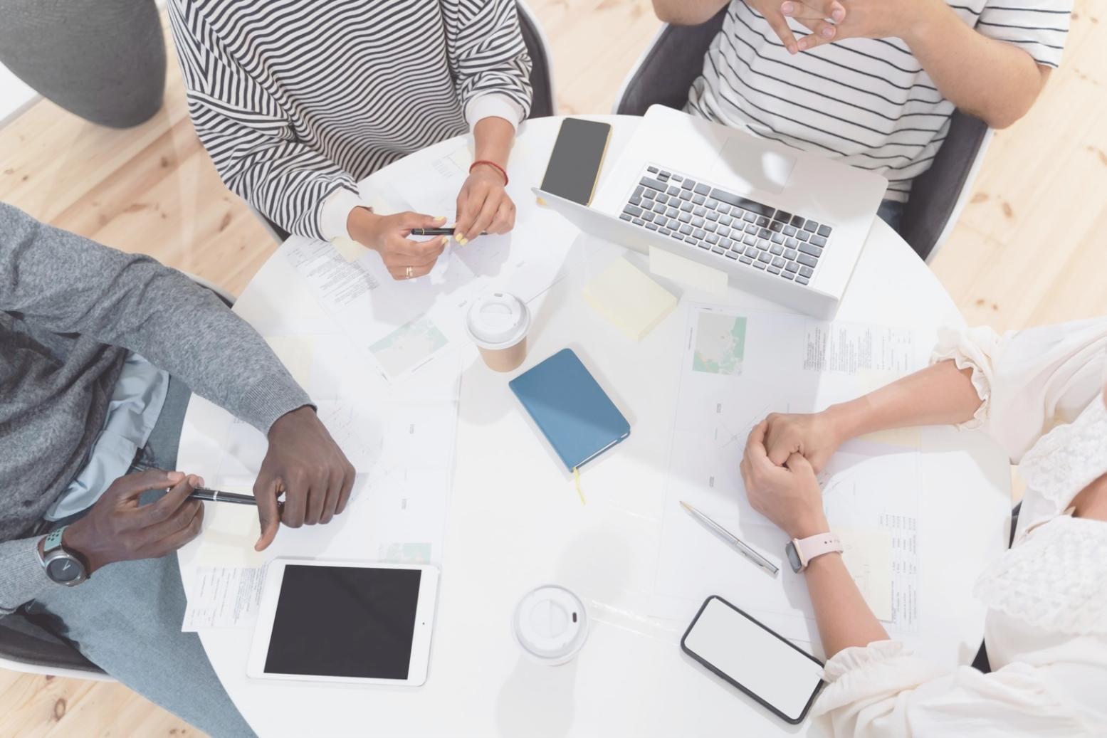 Financial analysis workspace with charts and planning materials